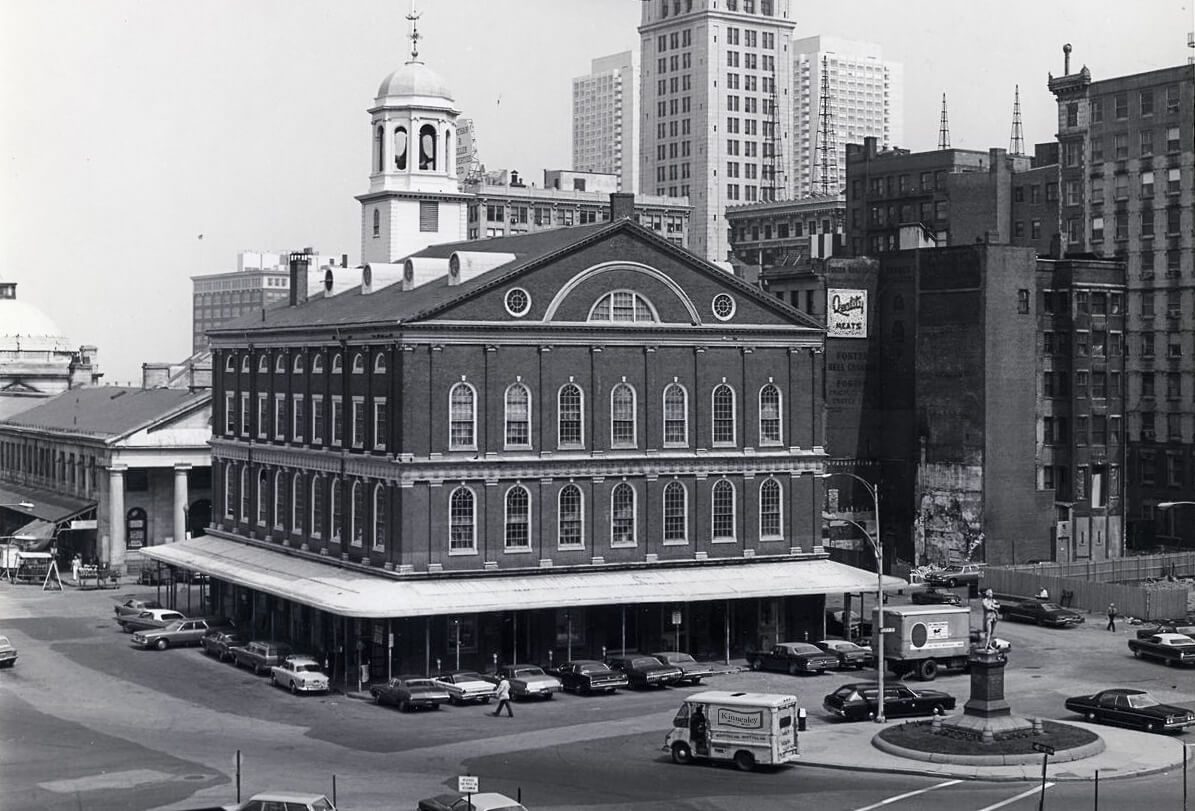A black and white photo of a Faneuil Hall.
